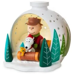 Hallmark Peanuts® Charlie Brown, Snoopy And Woodstock On Sled Light-Up Figurine, 4.6"